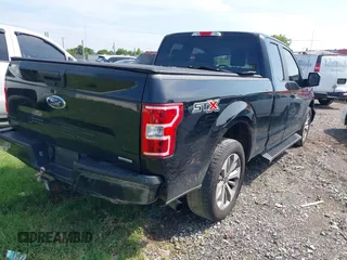 2018 Ford F-150 XL with VIN 1FTEX1CPXJKE63642, listed as a IAAI auction lot 42768090 with 147,219 mi miles and . Bid and sale history available at DreamBid. Image 4.