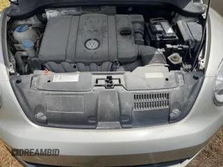 2013 Volkswagen Beetle 2.5L with VIN 3VW5X7AT2DM825928, listed as a Copart auction lot 66500855 with 48,795 mi miles and Salvage title. Bid and sale history available at DreamBid. Image 7.