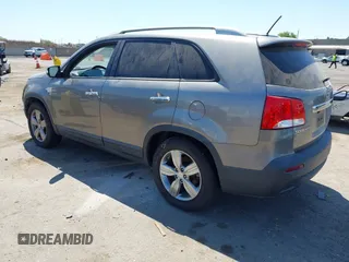 2012 Kia Sorento EX with VIN 5XYKU3A60CG305675, listed as a IAAI auction lot 42647223 with 174,447 mi miles and . Bid and sale history available at DreamBid. Image 3.