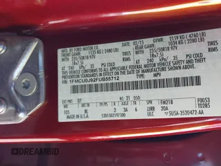 2015 Ford Escape Titanium with VIN 1FMCU0J92FUB55712, listed as a IAAI auction lot 41627867 with 156,438 mi miles. Bid and sale history available at carsss.com. Image 9.