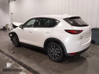 2017 Mazda CX-5 Grand Touring with VIN JM3KFBDL1H0203358, listed as a IAAI auction lot 41526776 with 63,167 mi miles. Bid and sale history available at carsss.com. Image 3.