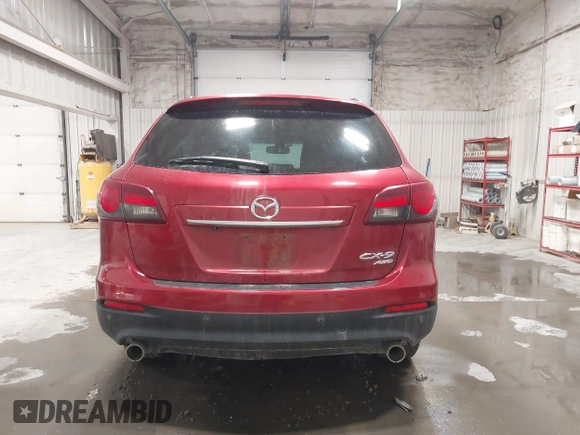 2015 Mazda CX-9 Grand Touring z VIN JM3TB3DAXF0464215, wystawiony jako IAAI lot #42043092 z przebiegiem 119 269 mil mil oraz . Historia ofert i sprzedaży dostępna na DreamBid. Obrazek 16.