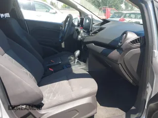 2014 Ford Fiesta S z VIN 3FADP4AJ0EM102338, wystawiony jako IAAI lot #42670979 z przebiegiem 141 301 mil mil oraz . Historia ofert i sprzedaży dostępna na DreamBid. Obrazek 5.