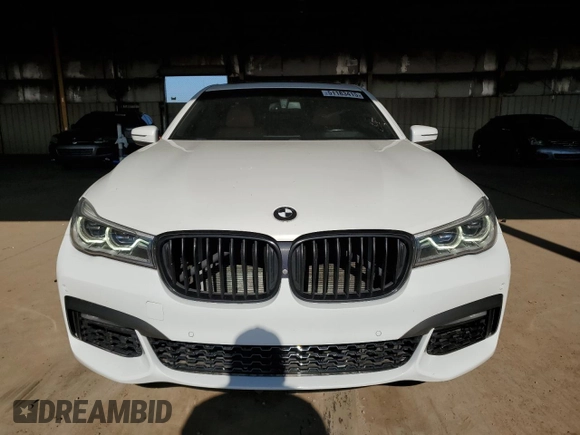 2016 BMW 7 Series 750i с VIN WBA7F0C56GGM20803, выставлен на аукционе Copart как лот 51183415 с пробегом 70 728 миль миль и Чистый • Clean title. История ставок и продаж доступна на DreamBid. Изображение 5.