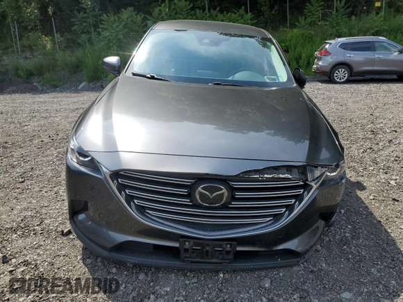 2019 Mazda CX-9 Touring z VIN JM3TCBCY5K0328655, wystawiony jako Copart lot #64627255 z przebiegiem 54 658 mil mil oraz Szkoda całkowita • Salvage title. Historia ofert i sprzedaży dostępna na DreamBid. Obrazek 5.