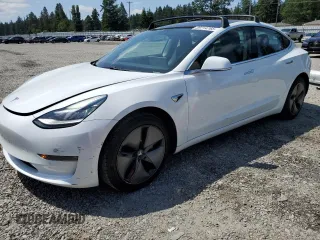 2018 Tesla Model 3 Long Range Battery z VIN 5YJ3E1EB5JF115632, wystawiony jako Copart lot #59714765 z przebiegiem 49 151 mil mil oraz Szkoda całkowita • Salvage title. Historia ofert i sprzedaży dostępna na DreamBid. Obrazek 1.