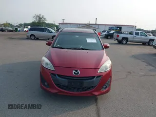 2014 Mazda 5 Grand Touring z VIN JM1CW2DL7E0166678, wystawiony jako IAAI lot #42438124 z przebiegiem 117 775 mil mil oraz . Historia ofert i sprzedaży dostępna na DreamBid. Obrazek 6.
