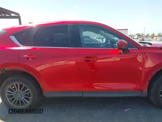 2019 Mazda CX-5 Touring with VIN JM3KFACM5K1516242, listed as a IAAI auction lot 42019803 with 113,953 mi miles. Bid and sale history available at carsss.com. Image 13.