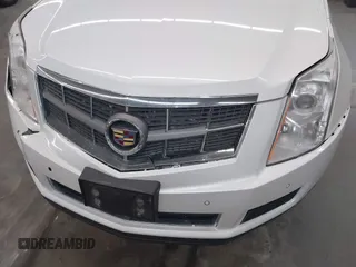 2011 Cadillac SRX Luxury Collection z VIN 3GYFNDEY9BS561269, wystawiony jako IAAI lot #42160187 z przebiegiem 206 725 mil mil oraz . Historia ofert i sprzedaży dostępna na DreamBid. Obrazek 6.