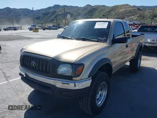 2002 Toyota Tacoma PreRunner z VIN 5TESN92N42Z102248, wystawiony jako IAAI lot #41964727 z przebiegiem 152 968 mil mil oraz . Historia ofert i sprzedaży dostępna na DreamBid. Obrazek 2.