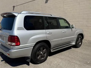 2006 Lexus LX 470 with VIN JTJHT00W664012277, listed as a Copart auction lot 52622595 with 255,183 mi miles and Clean Title. Bid and sale history available at DreamBid. Image 4.