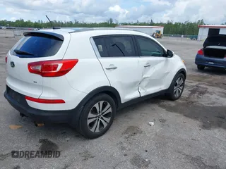 2013 Kia Sportage EX with VIN KNDPC3A21D7528487, listed as a IAAI auction lot 42556813 with 144,823 mi miles and . Bid and sale history available at DreamBid. Image 4.