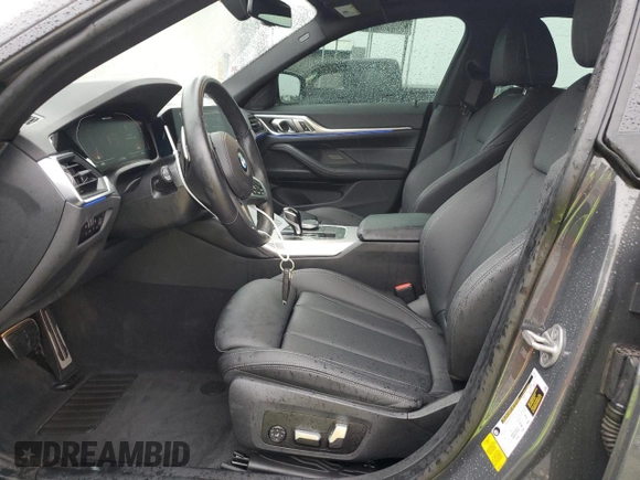 2023 BMW 4 Series M440i with VIN WBA63AW06PFN54632, listed as a Copart auction lot 70994044 with 11,718 mi miles and Salvage title. Bid and sale history available at DreamBid. Image 7.