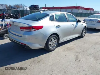 2016 Kia Optima LX with VIN 5XXGT4L37GG084538, listed as a IAAI auction lot 41784807 with 128,928 mi miles. Bid and sale history available at carsss.com. Image 4.