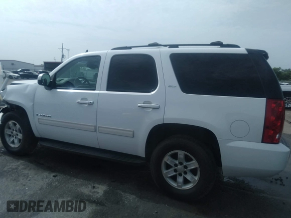 2009 GMC Yukon SLT w/4SB with VIN 1GKFC33049R272997, listed as a IAAI auction lot 39935360 with 290,952 mi miles. Bid and sale history available at carsss.com. Image 14.