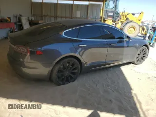 2017 Tesla Model S 60 z VIN 5YJSA1E18HF192715, wystawiony jako Copart lot #56851225 z przebiegiem 103 231 mil mil oraz Szkoda całkowita • Salvage title. Historia ofert i sprzedaży dostępna na DreamBid. Obrazek 3.