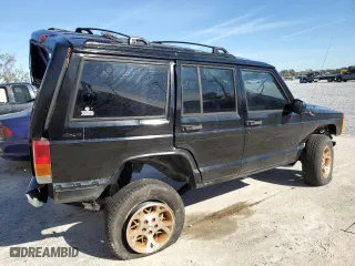 2000 Jeep Cherokee Police with VIN 1J4FF48S1YL246243, listed as a Copart auction lot 84954674 with 0 mi miles and Salvage Title. Bid and sale history available at carsss.com. Image 3.