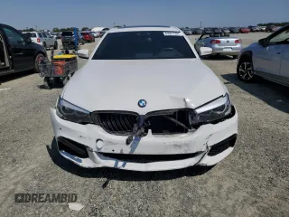 2020 BMW 5 Series 530e with VIN WBAJA9C03LCD28842, listed as a Copart auction lot 69901984 with 63,036 mi miles and Salvage Title. Bid and sale history available at DreamBid. Image 5.