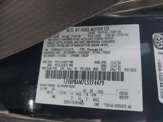 2012 Ford Mustang V6 Premium with VIN 1ZVBP8AM7C5274479, listed as a IAAI auction lot 41772945 with 174,759 mi miles. Bid and sale history available at carsss.com. Image 9.