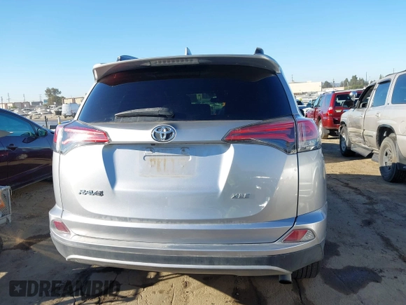 2018 Toyota RAV4 XLE with VIN 2T3WFREV8JW474230, listed as a IAAI auction lot 42687475 with 182,264 mi miles and . Bid and sale history available at DreamBid. Image 16.