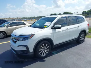2020 Honda Pilot EX-L with VIN 5FNYF5H59LB028268, listed as a IAAI auction lot 42355620 with 107,033 mi miles and . Bid and sale history available at DreamBid. Image 17.