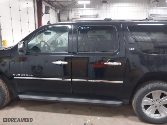 2012 Chevrolet Suburban LTZ with VIN 1GNSKKE77CR326924, listed as a IAAI auction lot 41764487 with 198,224 mi miles. Bid and sale history available at carsss.com. Image 15.