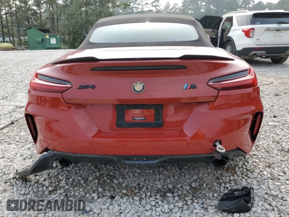 2019 BMW Z4 sDrive30i with VIN WBAHF3C51KWW21559, listed as a Copart auction lot 54460324 with 0 mi miles and Salvage Title. Bid and sale history available at carsss.com. Image 6.