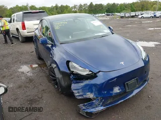 2024 Tesla Model Y Performance z VIN 7SAYGDEF1RA265382, wystawiony jako IAAI lot #42308468 z przebiegiem 9 700 mil mil oraz . Historia ofert i sprzedaży dostępna na DreamBid. Obrazek 1.