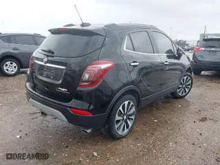 2019 Buick Encore Essence with VIN KL4CJCSM3KB751199, listed as a IAAI auction lot 41557436 with 88,475 mi miles. Bid and sale history available at carsss.com. Image 4.