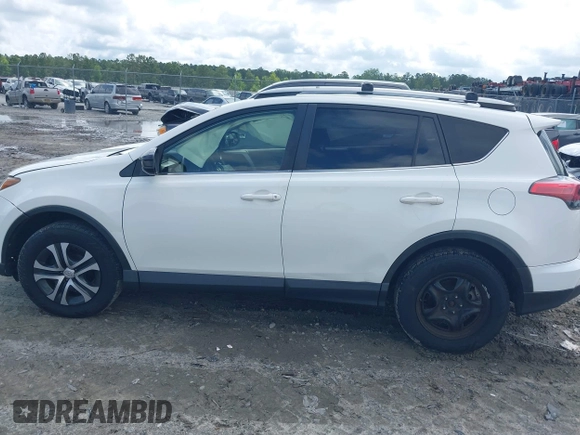 2017 Toyota RAV4 LE with VIN JTMBFREV8HJ700774, listed as a IAAI auction lot 42439345 with 96,907 mi miles and . Bid and sale history available at DreamBid. Image 14.
