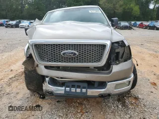 2004 Ford F-150 XLT with VIN 1FTPW14534KA52354, listed as a Copart auction lot 51713855 with 148,707 mi miles and Salvage title. Bid and sale history available at DreamBid. Image 5.