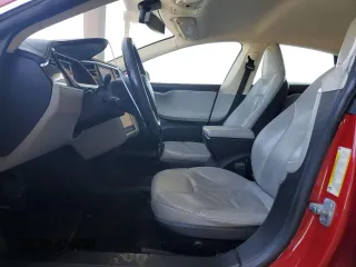 2013 Tesla Model S with VIN 5YJSA1AG5DFP12177, listed as a Copart auction lot 61846195 with 130,668 mi miles and Salvage title. Bid and sale history available at DreamBid. Image 7.