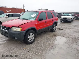 2002 Ford Escape XLT Choice with VIN 1FMYU04152KC40559, listed as a IAAI auction lot 41497098 with 200,986 mi miles. Bid and sale history available at carsss.com. Image 2.
