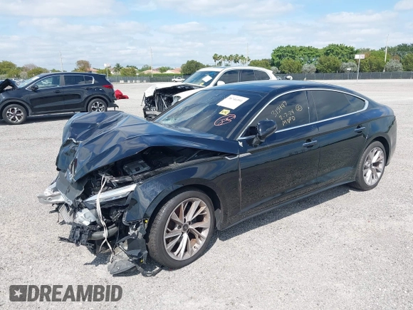 2021 Audi A5 Sportback Premium with VIN WAUABCF53MA036944, listed as a IAAI auction lot 38746591 with 35,881 mi miles. Bid and sale history available at carsss.com. Image 2.