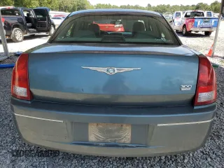 2005 Chrysler 300 Touring z VIN 2C3JA53G65H574021, wystawiony jako Copart lot #70073414 z przebiegiem 291 219 mil mil oraz Szkoda całkowita • Salvage title. Historia ofert i sprzedaży dostępna na DreamBid. Obrazek 6.