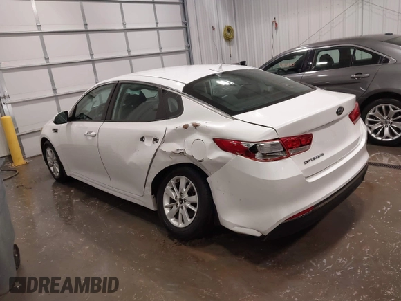 2016 Kia Optima LX with VIN 5XXGT4L38GG048180, listed as a IAAI auction lot 41923650 with 58,018 mi miles. Bid and sale history available at carsss.com. Image 3.