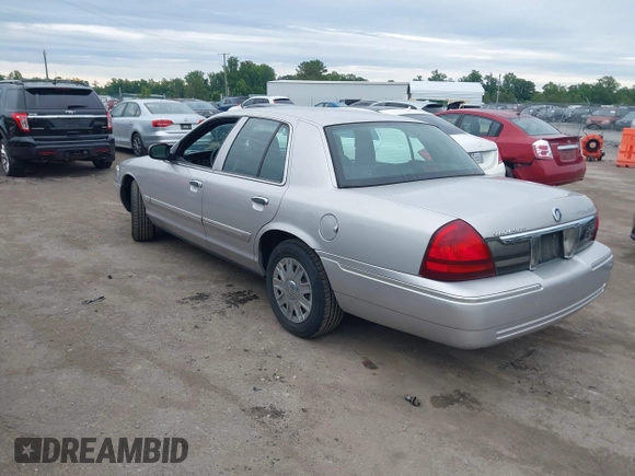 2006 Mercury Grand Marquis GS z VIN 2MEFM74V16X646802, wystawiony jako IAAI lot #42358697 z przebiegiem 169 321 mil mil oraz . Historia ofert i sprzedaży dostępna na DreamBid. Obrazek 3.