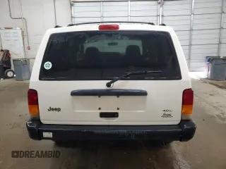 1997 Jeep Cherokee Sport with VIN 1J4FJ68S2VL518188, listed as a Copart auction lot 77459464 with 0 mi miles and Non Repairable. Bid and sale history available at carsss.com. Image 6.