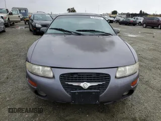 1997 Chrysler Sebring LXi z VIN 4C3AU52N2VE183090, wystawiony jako Copart lot #81855454 z przebiegiem 157 590 mil mil oraz Szkoda całkowita • Salvage title. Historia ofert i sprzedaży dostępna na DreamBid. Obrazek 5.