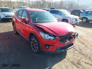 2016 Mazda CX-5 Grand Touring with VIN JM3KE4DYXG0908328, listed as a IAAI auction lot 41656600 with 102,791 mi miles. Bid and sale history available at carsss.com. Image 1.