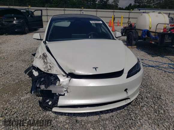 2025 Tesla Model 3 Long Range with VIN 5YJ3E1EA3SF889774, listed as a Copart auction lot 57493425 with 5,167 mi miles and Salvage title. Bid and sale history available at DreamBid. Image 5.