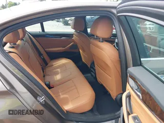 2018 BMW 5 Series 530i xDrive with VIN WBAJA7C55JG909519, listed as a IAAI auction lot 42650263 with 57,077 mi miles and . Bid and sale history available at DreamBid. Image 8.