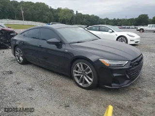 2023 Audi A7 Prestige with VIN WAUV2BF28PN042818, listed as a Copart auction lot 70894594 with 5,486 mi miles and Salvage Title. Bid and sale history available at carsss.com. Image 4.