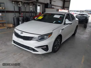 2019 Kia Optima LX with VIN 5XXGT4L37KG320078, listed as a IAAI auction lot 41598649 with 128,439 mi miles. Bid and sale history available at carsss.com. Image 2.