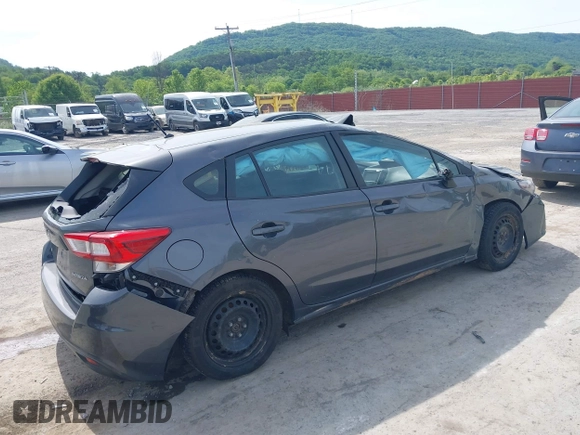 2018 Subaru Impreza with VIN 4S3GTAA60J3731249, listed as a IAAI auction lot 42294911 with 73,342 mi miles and . Bid and sale history available at DreamBid. Image 4.