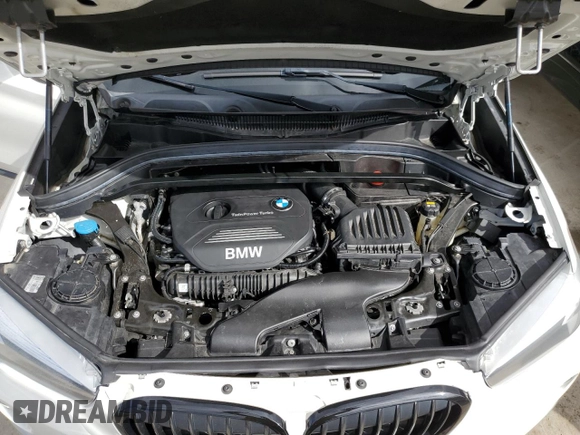 2018 BMW X1 sDrive28i with VIN WBXHU7C38J5H40248, listed as a Copart auction lot 66158662 with 59,903 mi miles. Bid and sale history available at carsss.com. Image 7.