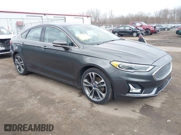 2019 Ford Fusion Titanium with VIN 3FA6P0K9XKR259556, listed as a IAAI auction lot 41823997 with 132,071 mi miles. Bid and sale history available at carsss.com. Image 1.