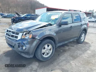 2012 Ford Escape XLT with VIN 1FMCU0D76CKC01916, listed as a IAAI auction lot 41879331 with 194,201 mi miles. Bid and sale history available at carsss.com. Image 2.