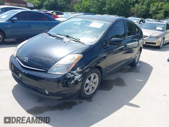 2007 Toyota Prius z VIN JTDKB20U477685610, wystawiony jako IAAI lot #42433569 z przebiegiem 197 598 mil mil oraz . Historia ofert i sprzedaży dostępna na DreamBid. Obrazek 2.