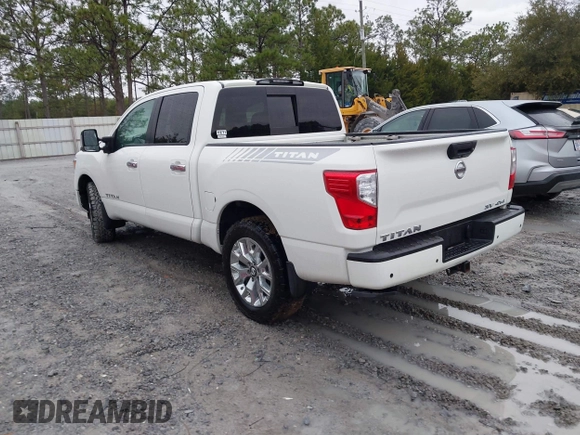 2021 Nissan Titan Pro-4X with VIN 1N6AA1ED6MN535519, listed as a IAAI auction lot 41482187 with 62,698 mi miles and . Bid and sale history available at DreamBid. Image 3.